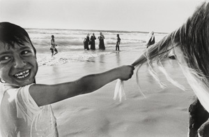 Lot 4288, Auction  125, Wiedenhöfer, Kai, Palestinian boy playing with a horsetail at the beach of Gaza City